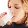 Woman Drinking A Glass of Milk